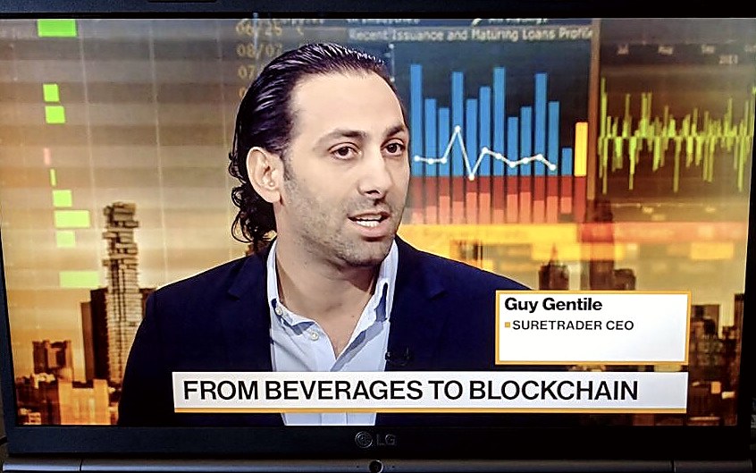 Guy Gentile interviewed on Bloomberg TV chyron reads 'From Beverages to Blockchain'